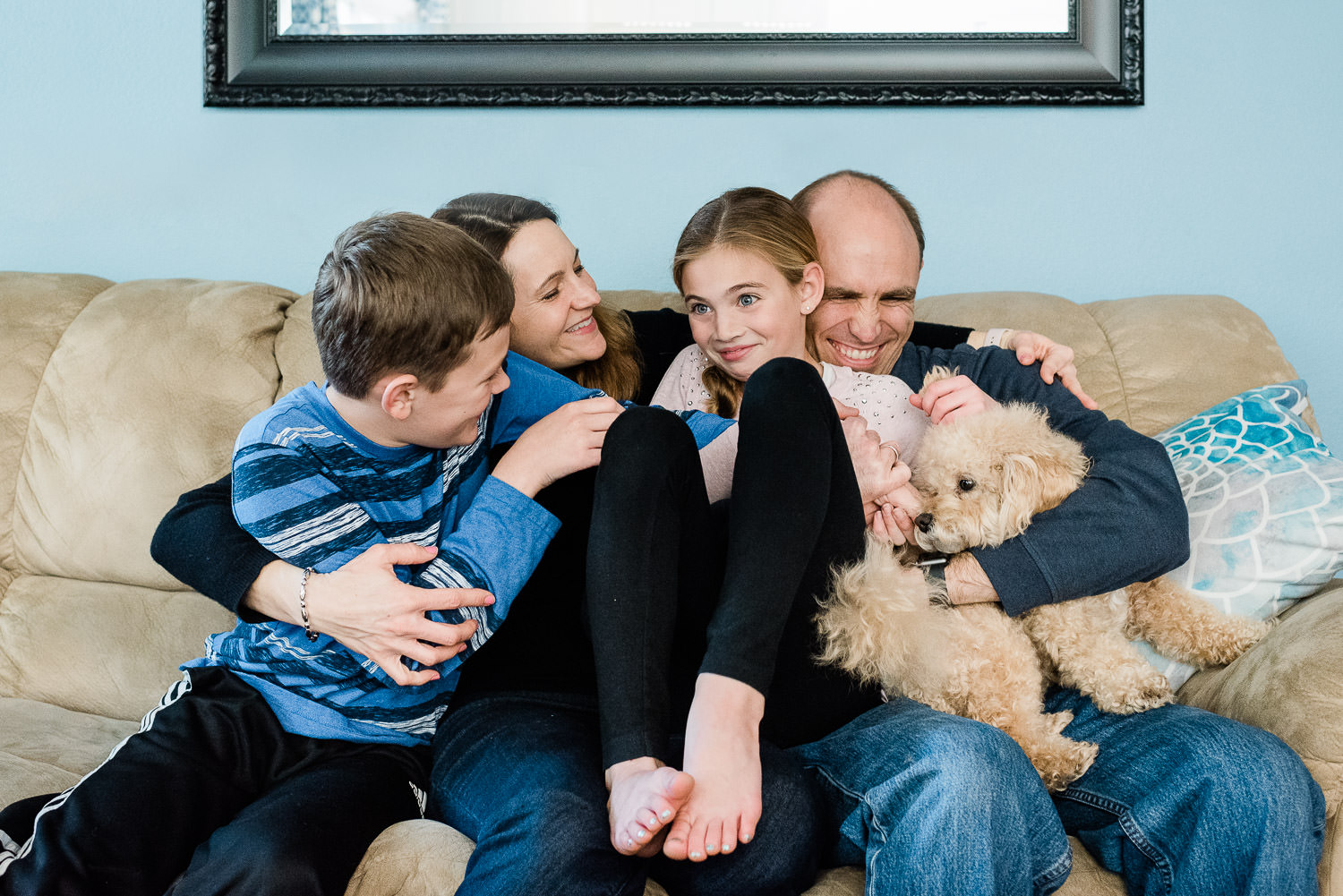 indoor family portrait with dog